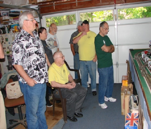 View of visit to the layout of member Jim Stetson from visit by San Joaquin Toy Train Operators Lionel Club Ambassador