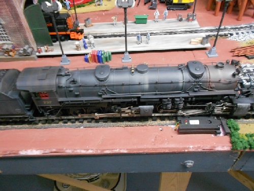 The TMB Model Train Club Lionel Club Ambassador shows off Lionels Weathered locomotive 6-82486 on the layout for the product review Showing off Lionels Weathered locomotive 6-82486 on the layout for the product review done by the TMB Model Train Club Lionel Club Ambassador