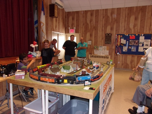 Running trains on their Layout the Nassau Lionel Operating Engineers Lionel Club Ambassador are at the Bellmore Presbyterian Church in Bellmore New York September 2016 Event At the Bellmore Presbyterian Church in Bellmore New York September 2016 Event the Lionel Club Ambassador Nassau Lionel Operating Engineers run trains on their layout