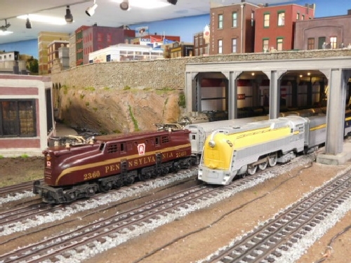 View of locomotives going through the tunnel on the layout October 2016 Open House held by the NLOE Lionel Club Ambassador