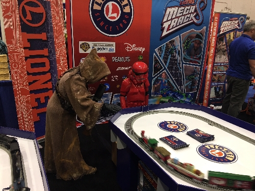 Lionels Mickeys Holiday to Remember Disney Christmas LionChief Train Set draws Star Wars Characters attention at the Chicago Toy  Game Week