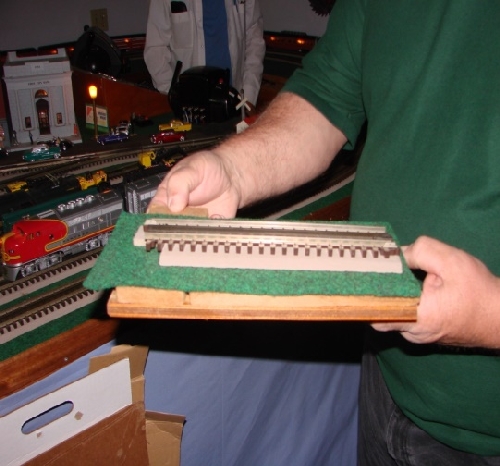 San Joaquin Toy Train Operators Lionel Club Ambassador view of 3 different layers of insulation on the layout of member Jim Stetson  View of 3 different layers of insulation on the layout of member Jim Stetson from visit by San Joaquin Toy Train Operators Lionel Club Ambassador