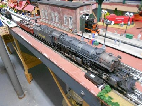 On the TMB Model Train Club Lionel Club Ambassador layout for their product review is the complete weathered steam locomotive 6-82486