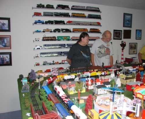 View of the 14 feet by 12 feet layout of member Genes Railroad Junction from visit by San Joaquin Toy Train Operators Lionel Club Ambassador