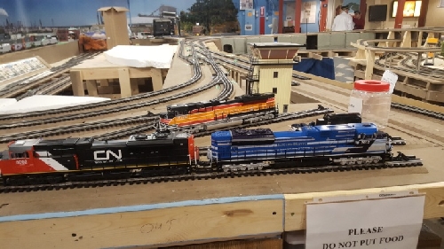 The Canadian National Southern Pacific and Electromotive diesels locomotives are waitng on the layout at the Chicagoland Lionel Railroad Club Lionel Club Ambassador Open House in October 2016 CLRC Lionel Club Ambassador has the Canadian National Southern Pacific and Electromotive diesels locomotives waitng on the layout at the October 2016 Open House