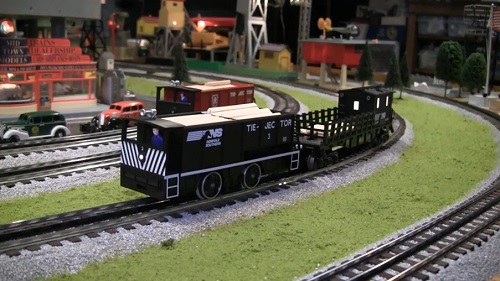 Chicagoland Lionel Railroad Club Lionel Club Ambassador Tie-Jector Norfolk Southern with Tie Caboose Video Review of Tie-Jector Norfolk Southern with Tie Caboose 6-81447  6-82094 Tie-Jector Norfolk Southern with Tie Caboose Video Review of Tie-Jector Norfolk Southern with Tie Caboose 6-81447  6-82094 byt the Chicagoland Lionel Railroad Club Lionel Club Ambassador