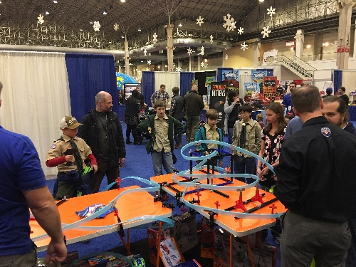 At the Chicago Toy  Game Week November 2016 Event boys and girls stop and take notice of Lionel Mega Tracks display