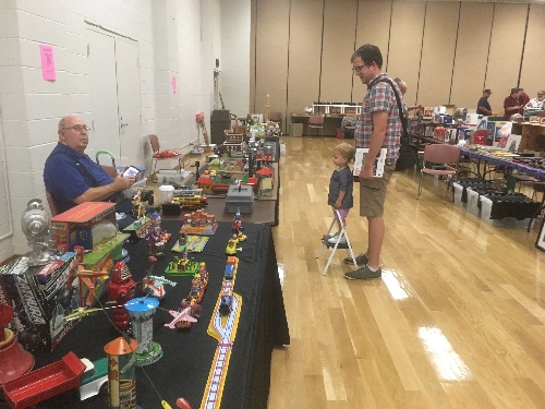 Even the youngest fan enthusiastically viewed the displays at the November 2016 Train Meet held by the TTOS  SPD a Lionel Club Ambassador