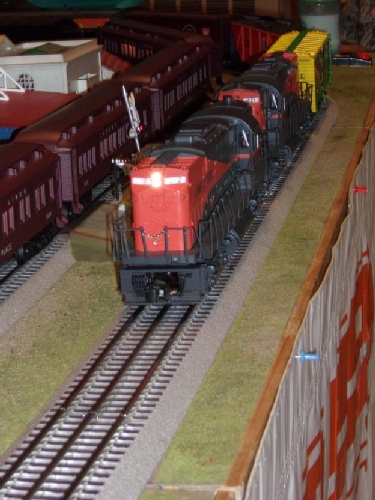 The locomotive is coming straight down the rails in Bellmore New York at the September 2016 Event where the NLOE Lionel Club Ambassador runs their model train layout 