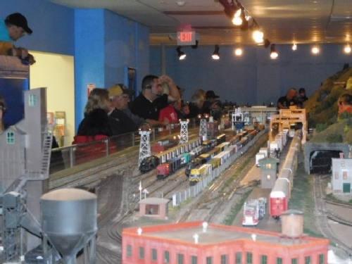 The Nassau Lionel Operating Engineers Lionel Club Ambassador had everyones attention as they operated trains and accessories on the elaborate layout at the October 2016 Open House