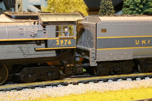 Image points out the details of the crew in the review of the Union Pacific LionMaster TMCC 4-6-6-4 Challenger 3976 6-38023 by the CLRC Lionel Club Ambassador Lionel Club Ambassador Chicagoland Lionel Railroad Club points out the crew details in the review of the Union Pacific LionMaster TMCC 4-6-6-4 Challenger 3976 6-38023