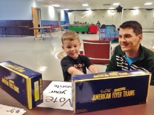 Boys ages 3 to 12 came to vote on the American Flyer Scale Cylindrical Hoppers shown in the Lionel Club Ambassador Wichita Toy Train Club product review