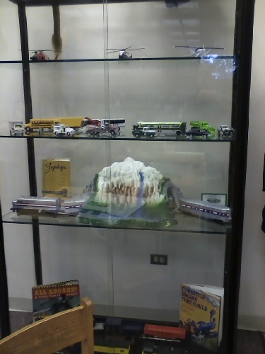 Chicagoland Lionel Railroad Club Lionel Club Ambassador contributes Amtrak cars to a module train display located at The Chicago Public Library - Bessie Coleman Branch Module train dsiplay located at The Chicago Public Library - Bessie Coleman Branch shows Amtrak trains contributed by the Chicagoland Lionel Railroad Club Lionel Club Ambassador