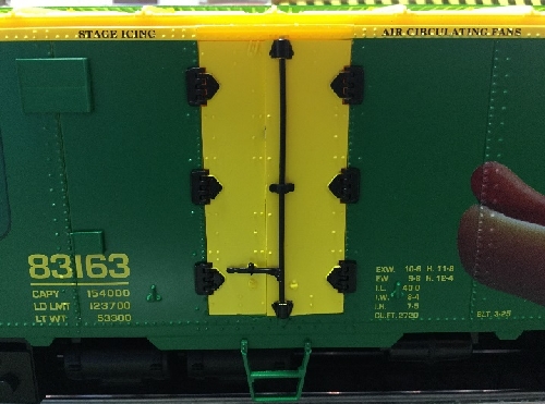 Lionel Club Ambassadors Nassau Lionel Operating Engineers shows off the doors on the Nathans 100 yrs Anniversary Reefer 83163 6-58266 The image shows hinged style doors on the Nathans 100 yrs Anniversary Reefer 83163 6-58266 in the product review by Nassau Lionel Operating Engineers Lionel Club Ambassadors