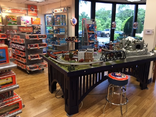 Excited to see the Model Train Layout in the Lionel Retail Store when visited by NJ Hi-Railers Lionel Ambassador Club when at Lionel in Concord NC New Jersey Hi-Railers Lionel Ambassador Club at Lionel in Concord NC see the exciting layout in the Lionel Retail Store