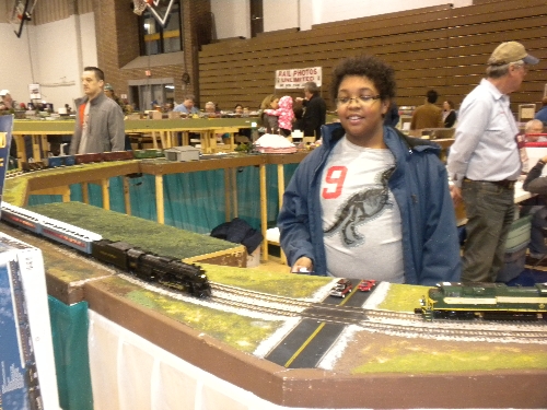 The Polar Express Train catches the eye of a boy at the High Wheeler 16 Show with Ambassador to Lionel Chicagoland Association of S Gaugers at  Harper College in Palatine IL   CASG Lionel Club Ambassador catches the eye of a boy noticing The Polar Express Train at High Wheeler 16 at Harper College in Palatine IL