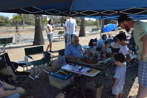 The Toy Train Operating Society Southern Pacific Division Lionel Club Ambassador is sharing the love of trains with kids at the Orange County Model Engineers event on September 18 2016 