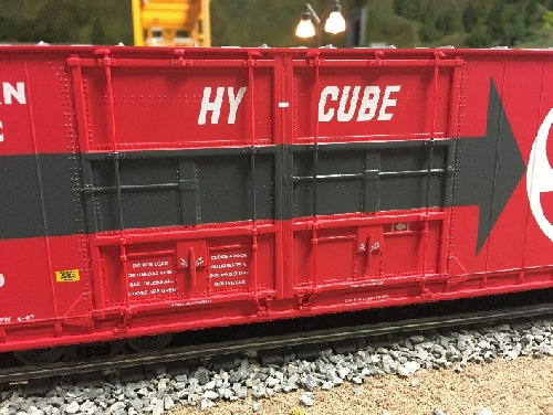 Showing the up close view of the 4 doors at one end in the NLOE Club Ambassadors to Lionel review of the SP 8-Door Hi-Cube Boxcar Nassau Lionel Operating Engineers Club Ambassadors to Lionel review of the Southern Pacific 8-Door Hi-Cube Boxcar showing the up close view of the 4 doors at one end