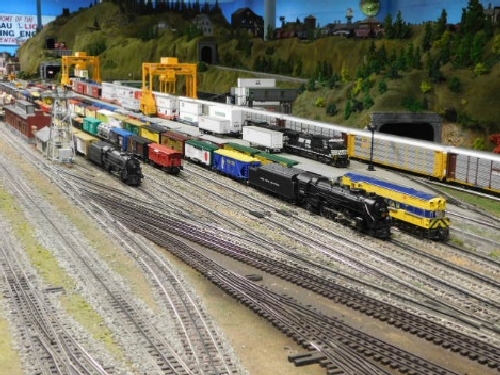 At the NLOE Lionel Club Ambassador October 2016 Open House you can see the model trains lined up in the railyard on the layout View of the model trains in the rail yard on the layout at the October 2016 Open House held by the Nassau Lionel Operating Engineers Lionel Club Ambassador