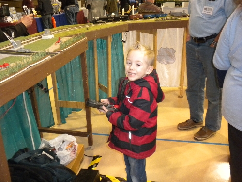 Boys love to run Trains as captured by an Ambassador to Lionel Chicagoland Association of S Gaugers at High Wheeler 16 Show at Harper College in Palatine IL    CASG Lionel Club Ambassador captures a boys love of running a train  at High Wheeler 16 at Harper College in Palatine IL