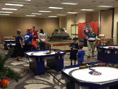 Kids enjoyed the Lionel Trains large display and layouts at the 46th Annual LCCA Convention in Kansas City MO July 24-30 2016 Kids play with a number of Lionels model train layouts in Kansas City MO at the Lionel Collectors Club of America 46th Annual Convention