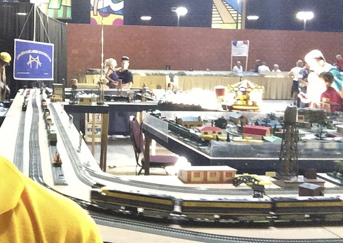 Families enjoy tThe modular layout at TTOS National Convention set up by the Golden Gate American Flyer Club a Lionel Club Ambassador