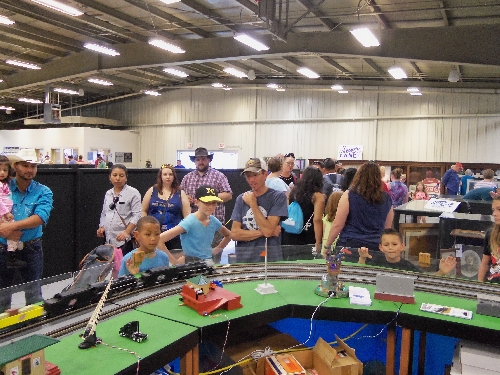 Crowds gathered to view the trains running on the Wichita Toy Train Club Lionel Club Ambassador layout at the 2016 Kansas State Fair in Hutchinson KS The Wichita Toy Train Club Lionel Club Ambassador had crowds gathered to view the trains running on layout set up at the 2016 Kansas State Fair