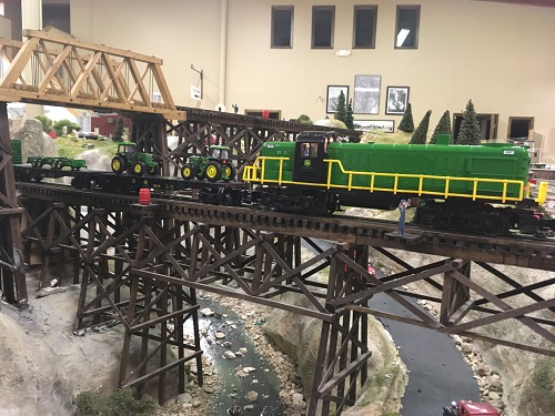 The John Deere Flatcar w2 spreaders and Ready-to-Run Train set looks great on the Lionel Club Ambassador WTTC layout