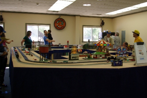 Fans at the Golden Gate American Flyer Club Lionel Ambassador view the modular layout at the Golden State Model Railroad Museum in Richmond CA July 23-24 and July 30-31 Image at the Golden State Model Railroad Museum in Richmond CA on July 23-24 and July 30-31 with fans of the modular layout set up by the GGAF Club CLUB AMBASSADORS TO LIONEL