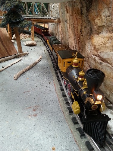 A view of The Western Union Telegraph locomotive and complete trains set 6-81264 through the layout in the product review by The TTOS  SSD Lionel Club Ambassador