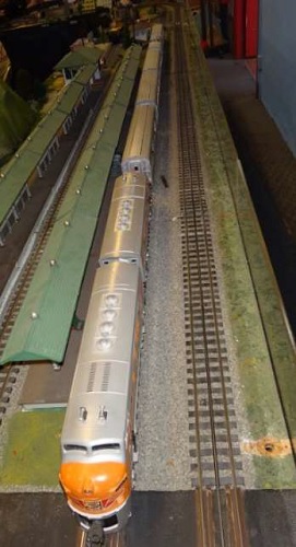 The Western Pacific F3 Locomotives pulling passenger cars as described by the QCHR Lionel Club Ambassador in their product review