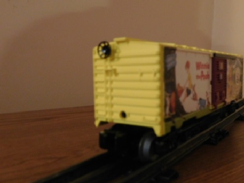 From the product review by Lionel Club Ambassador Nassau Lionel Operating Engineers an angle view of the Winnie the Pooh 50th Anniversary Boxcar 6-82913 Angle view of the Winnie the Pooh 50th Anniversary Boxcar 6-82913 in the product review by the NLOE a Lionel Club Ambassador