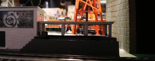 Showing the blinking light as the logs load in the operating Sawmill with Sound for the review by the Chicagoland Lionel Railroad Club Lionel Club Ambassador Lionel Club Ambassador The CLRC shows the blinking light when the logs load in the review of the operating Sawmill with Sound