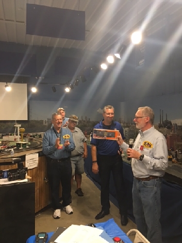 Howard Hitchcock presented Herb Koch president of the Chicagoland Lionel Railroad Club a one-of-a-kind Made in the USA boxcar Herb Koch president of the Chicagoland Lionel Railroad Club received a one-of-a-kind Made in the USA boxcar from Lionel President Howard Hitchcock