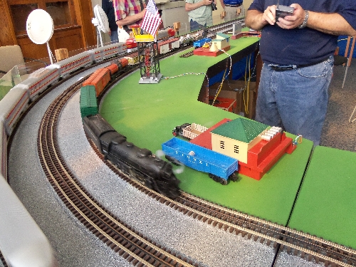Locomotive with smoke on the layout at the Wichita Toy Train ClubClub Ambassadors to Lionel July 2016 in Wichita KS